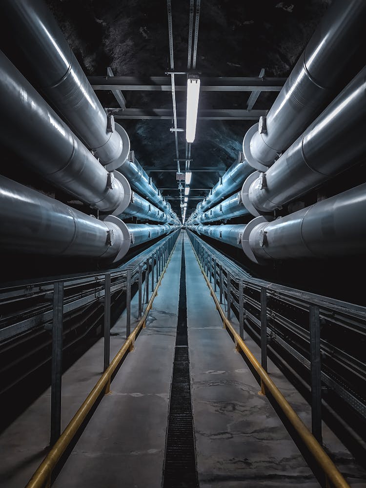 Gray And Yellow Metal Pipes