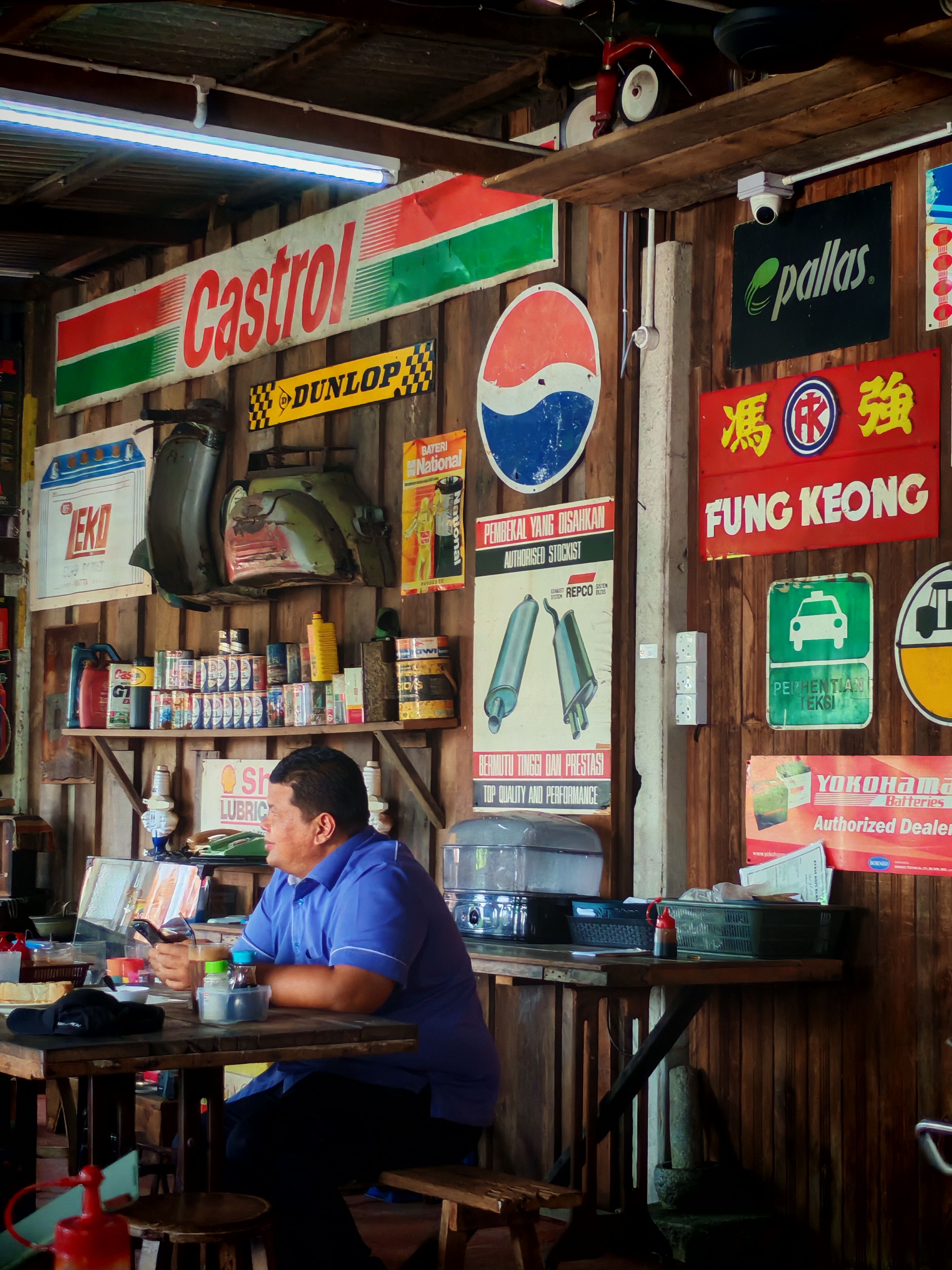 Retro Automotive Shop Interior with Vintage Signs