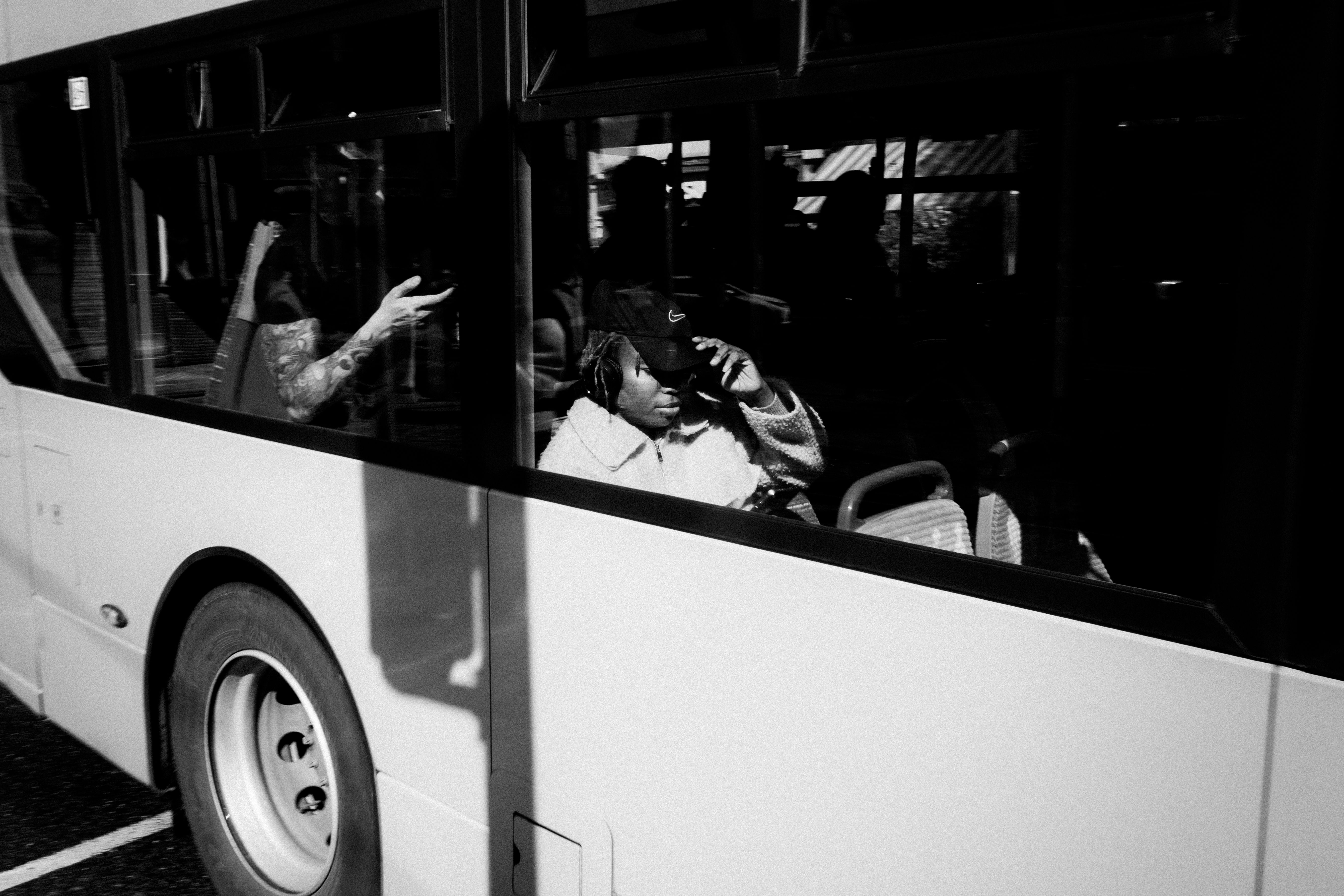 Candid street photography capturing people on a bus in Dublin, Ireland. - Dublín