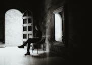 Moody Silhouette of Man in Rustic Interior
