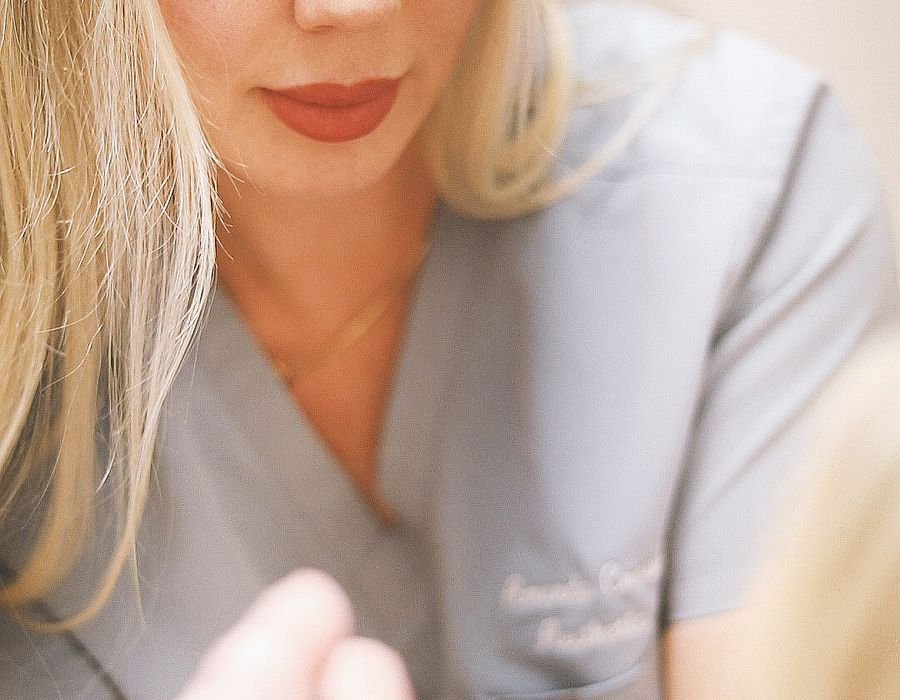 Aesthetic provider preparing a treatment