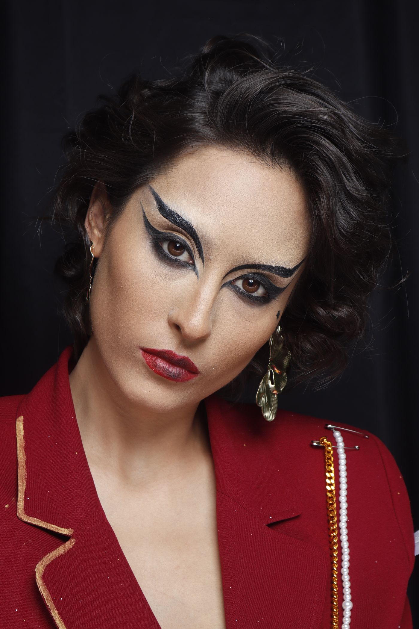 Editorial makeup with graphic eyeliner