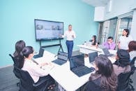 Business Meeting Presentation in Modern Office