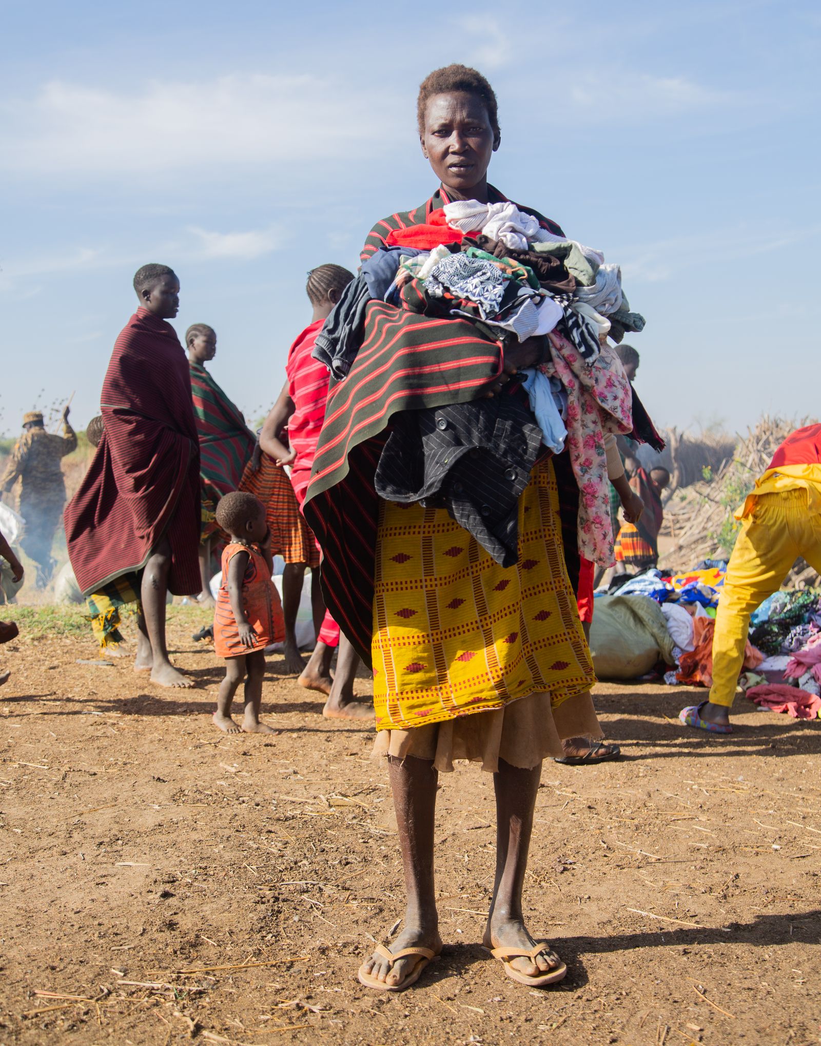African community gathering with people in traditional clothing