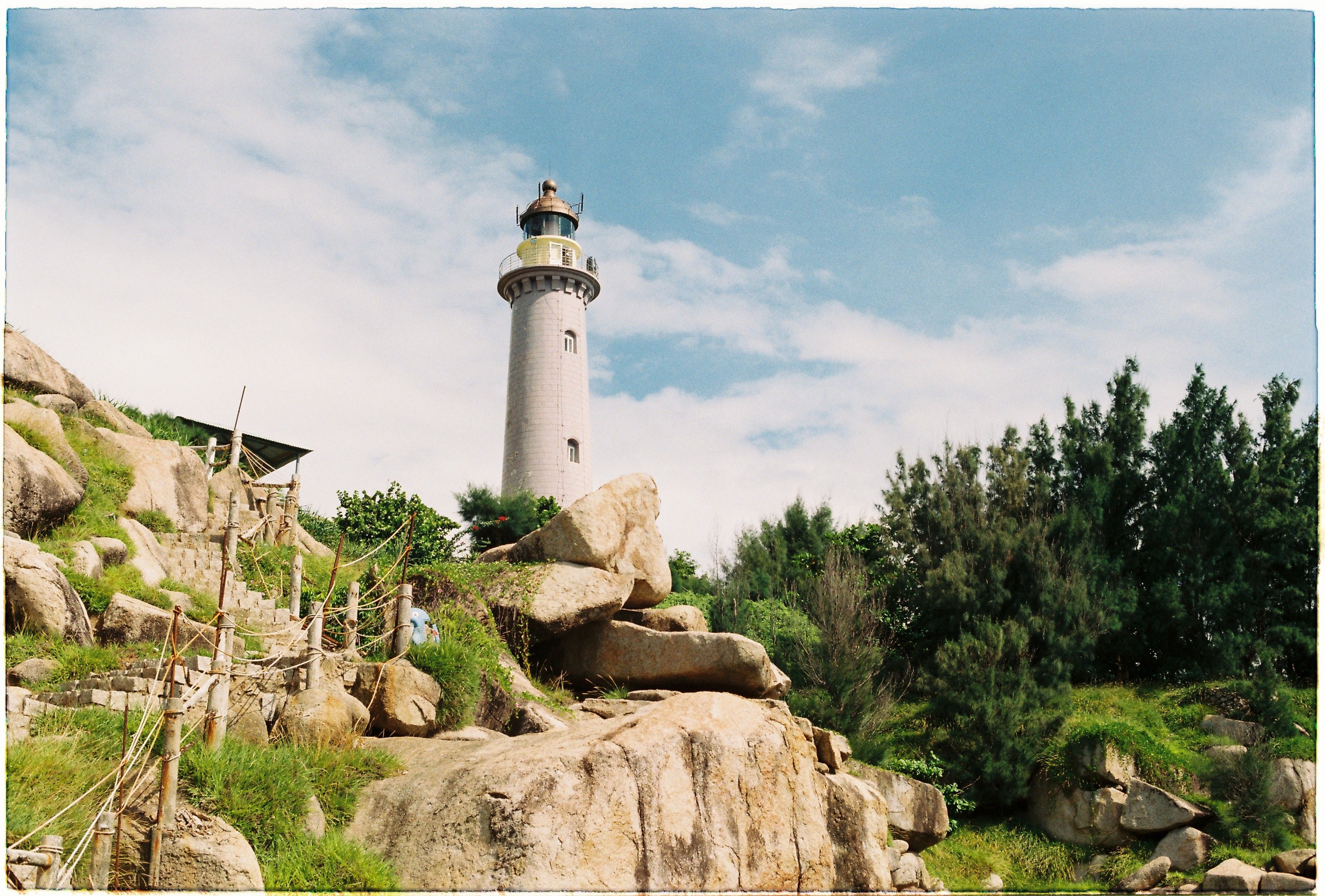 Scenic Lighthouse on Rocky Cliffside · Free Stock Photo
