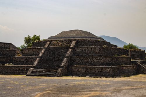 Free Stone pyramid at Teotihuacan's La Ciudadela under a clear sky, showcasing ancient Mexican architecture. Stock Photo