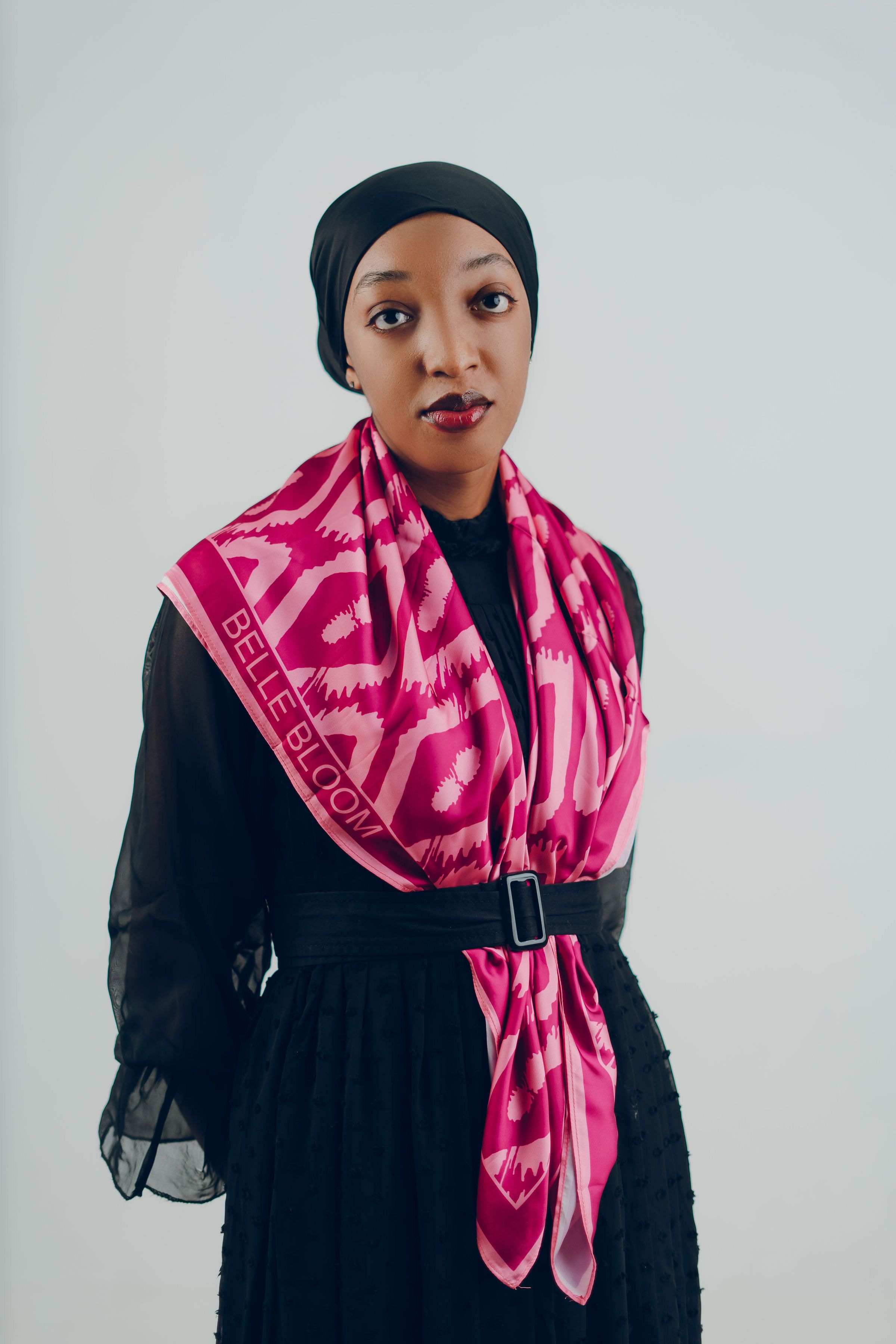 Elegant Woman in Pink Scarf and Black Dress Portrait  Free Stock Photo