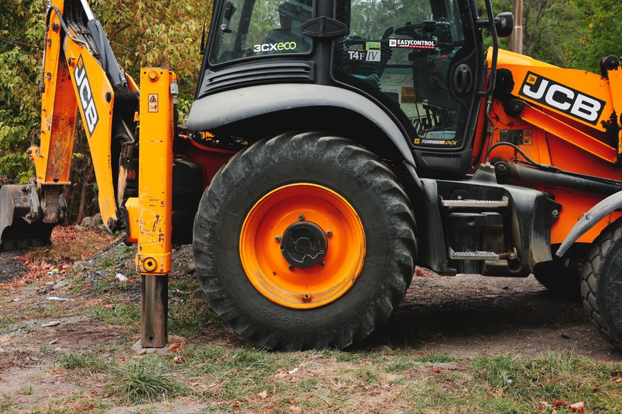 JCB backhoe loader on a construction site