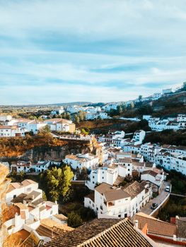 Breathtaking aerial view of white-washed villages against a vibrant landscape in Spain.