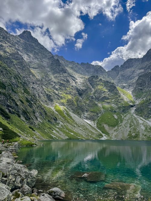 Free Breathtaking view of Czarny Staw lake in the Tatra Mountains, Poland, with turquoise waters and towering peaks. Stock Photo