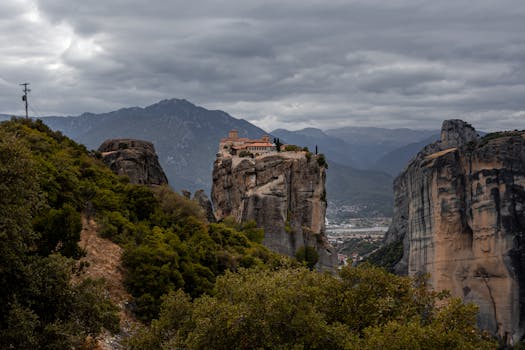 Scenic view of Meteora monasteries on stunning rock formations in Greece.