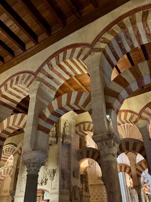 Free Detailed interior arches of the historic Mosque-Cathedral in Córdoba, Spain. Stock Photo