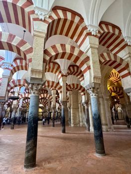Explore the architectural marvel of the Great Mosque of Córdoba with its iconic striped arches.