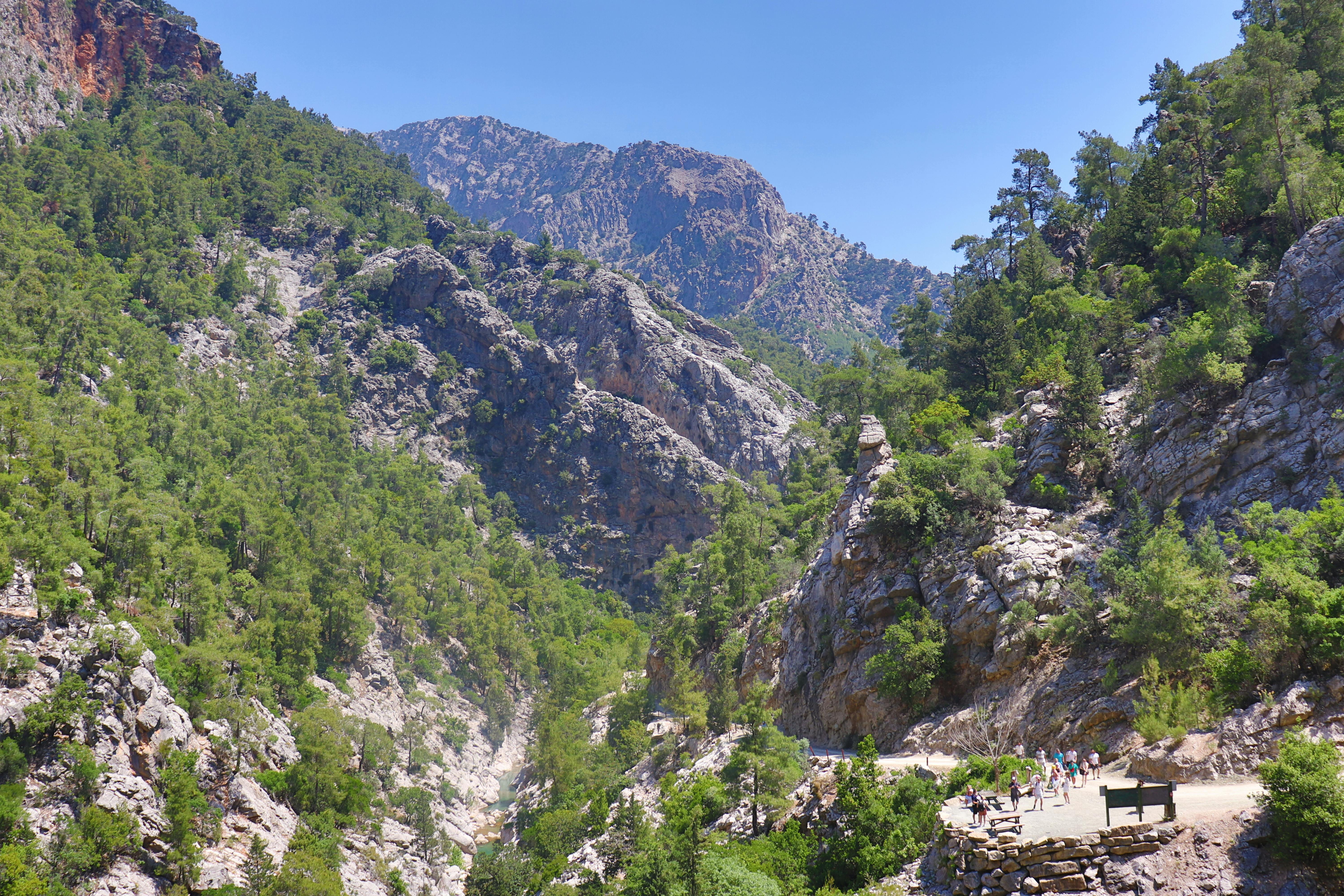 The dramatic Samaria Gorge in Crete offers an exhilarating hiking experience for adventurous couples, showcasing the island's rugged natural beauty.