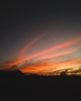 Stunning sunset with vibrant colors over the serene landscape in Ceará, Brazil.