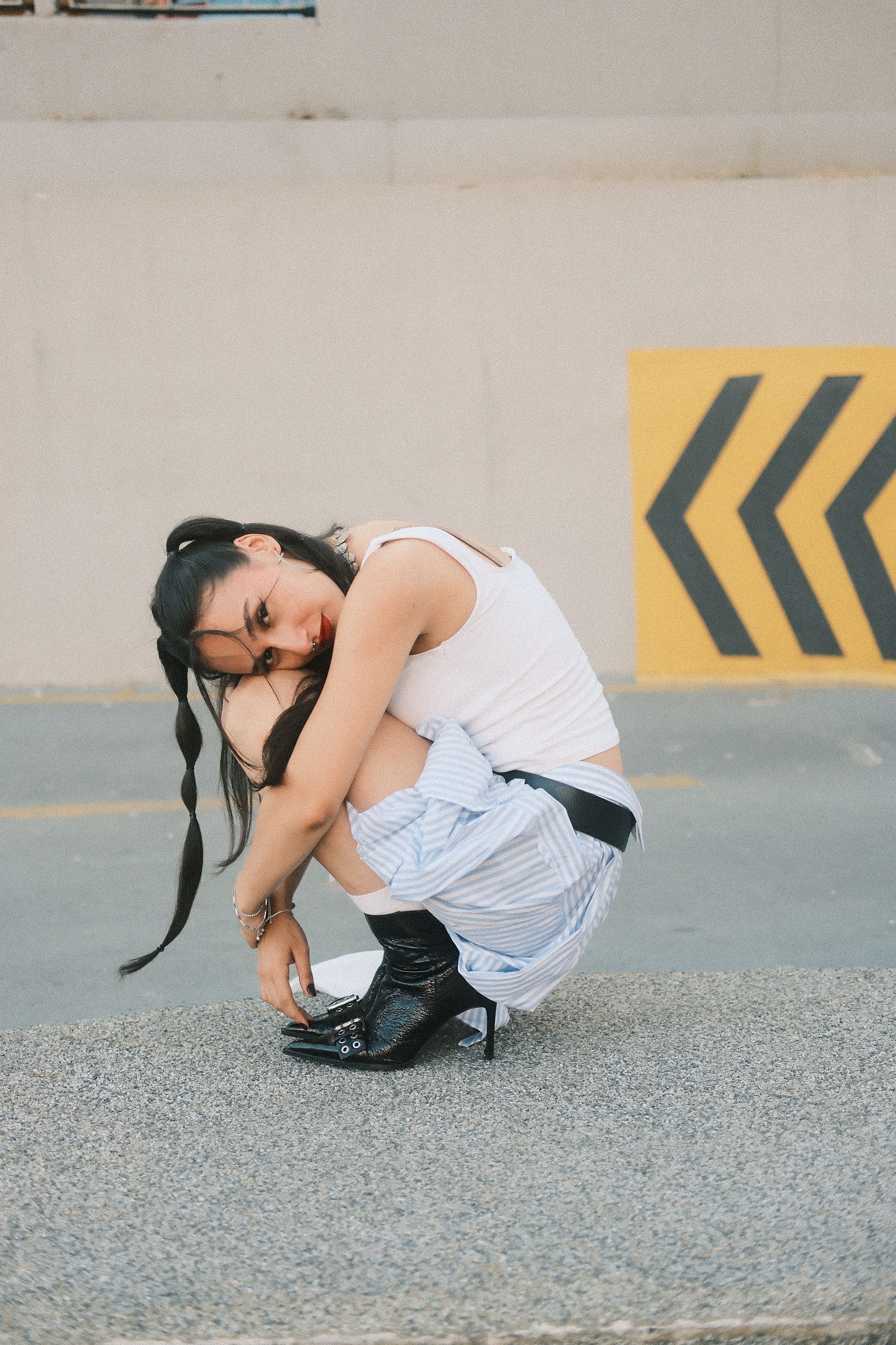 Stylish Young Woman in Urban Setting · Free Stock Photo