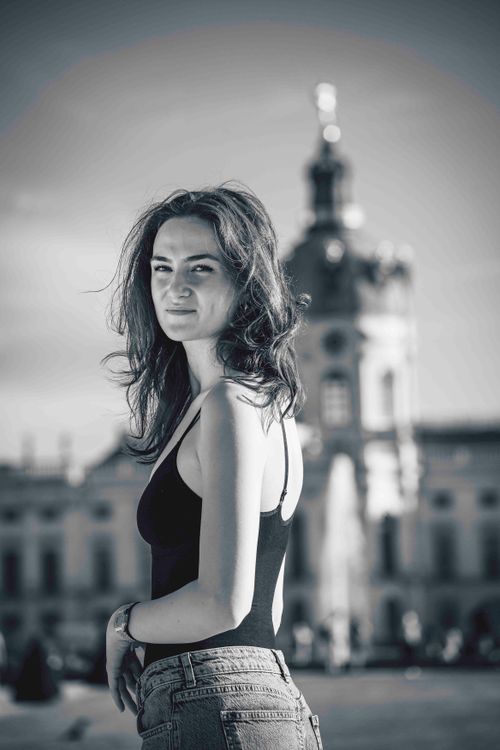 Free Black and white portrait of a woman with Charlottenburg Palace in the background. Stock Photo