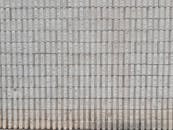 Textured grey brick wall background for design