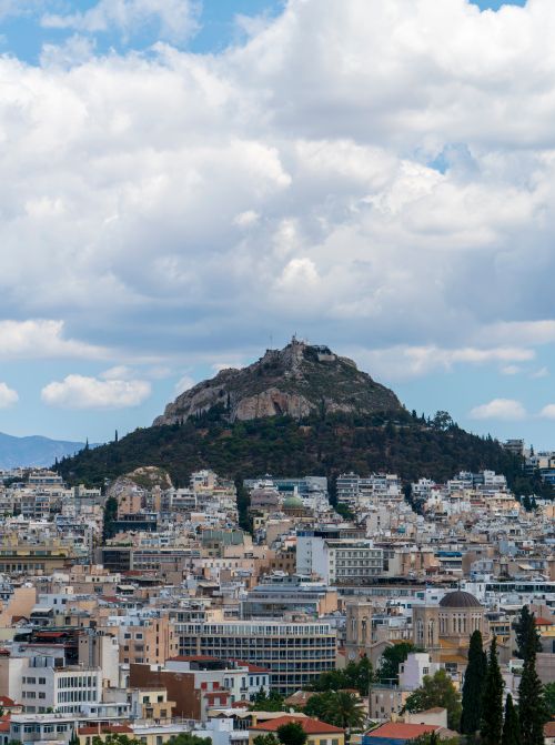 Free Scenic view of Lycabettus Hill towering over the cityscape of Athens, Greece. Stock Photo