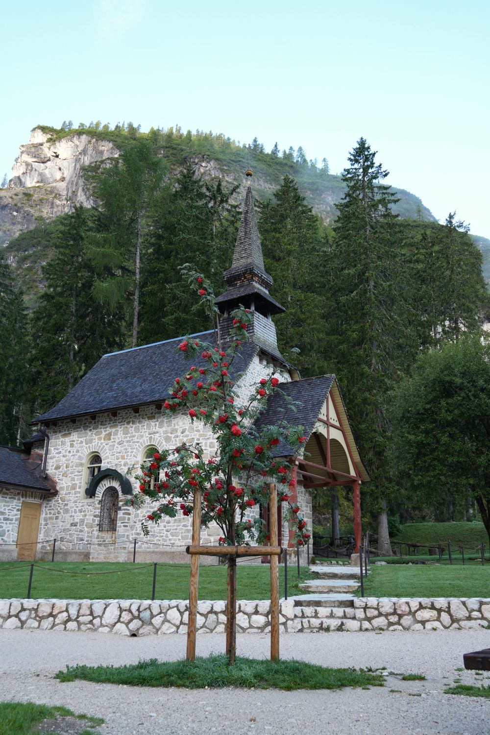 Quaint Stone Chapel Surrounded By Lush Forest Free Stock Photo quaint-stone-chapel-surrounded-by-lush-forest-free-stock-photo