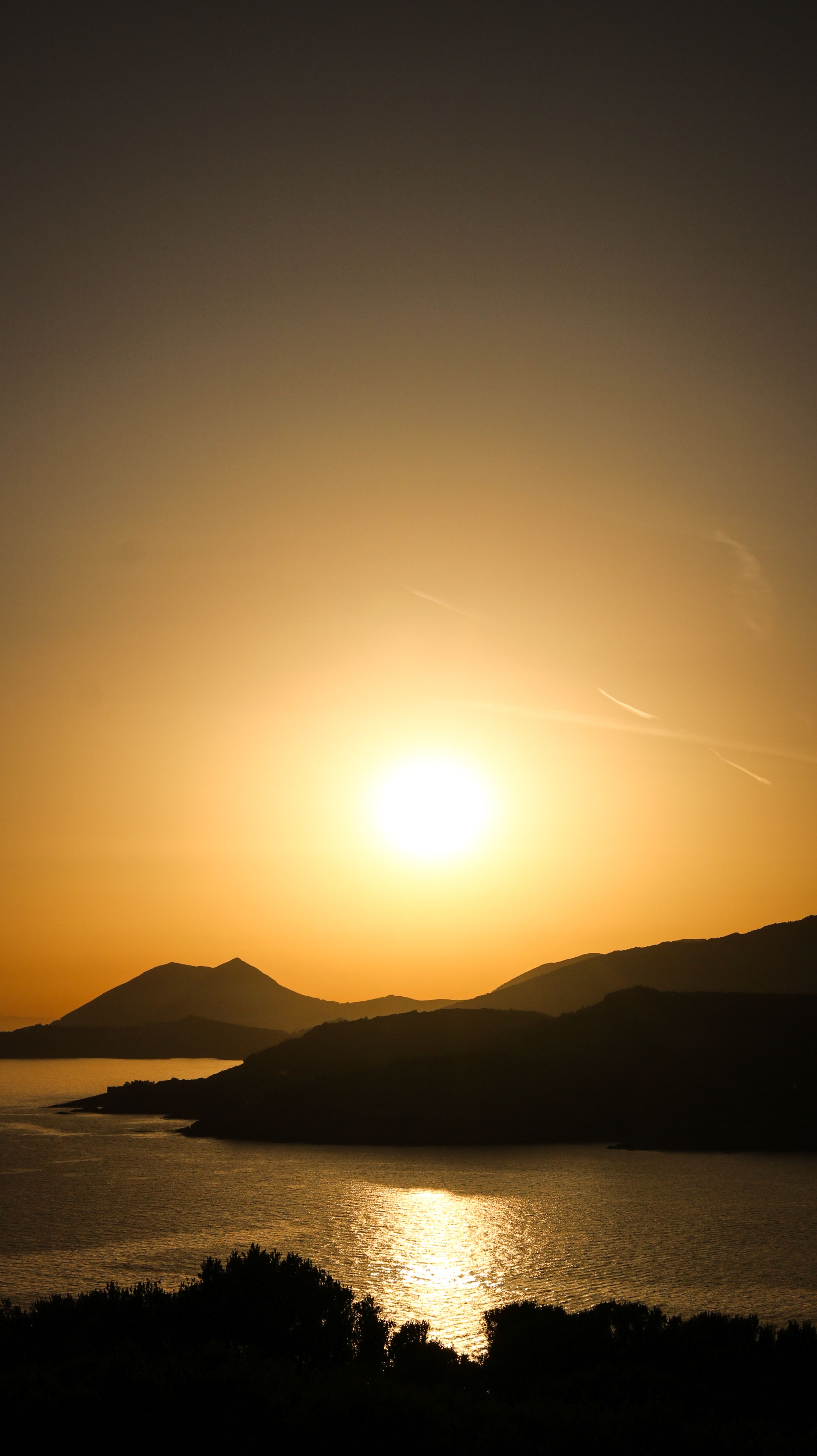 Serene Sunset Over Tranquil Waters · Free Stock Photo