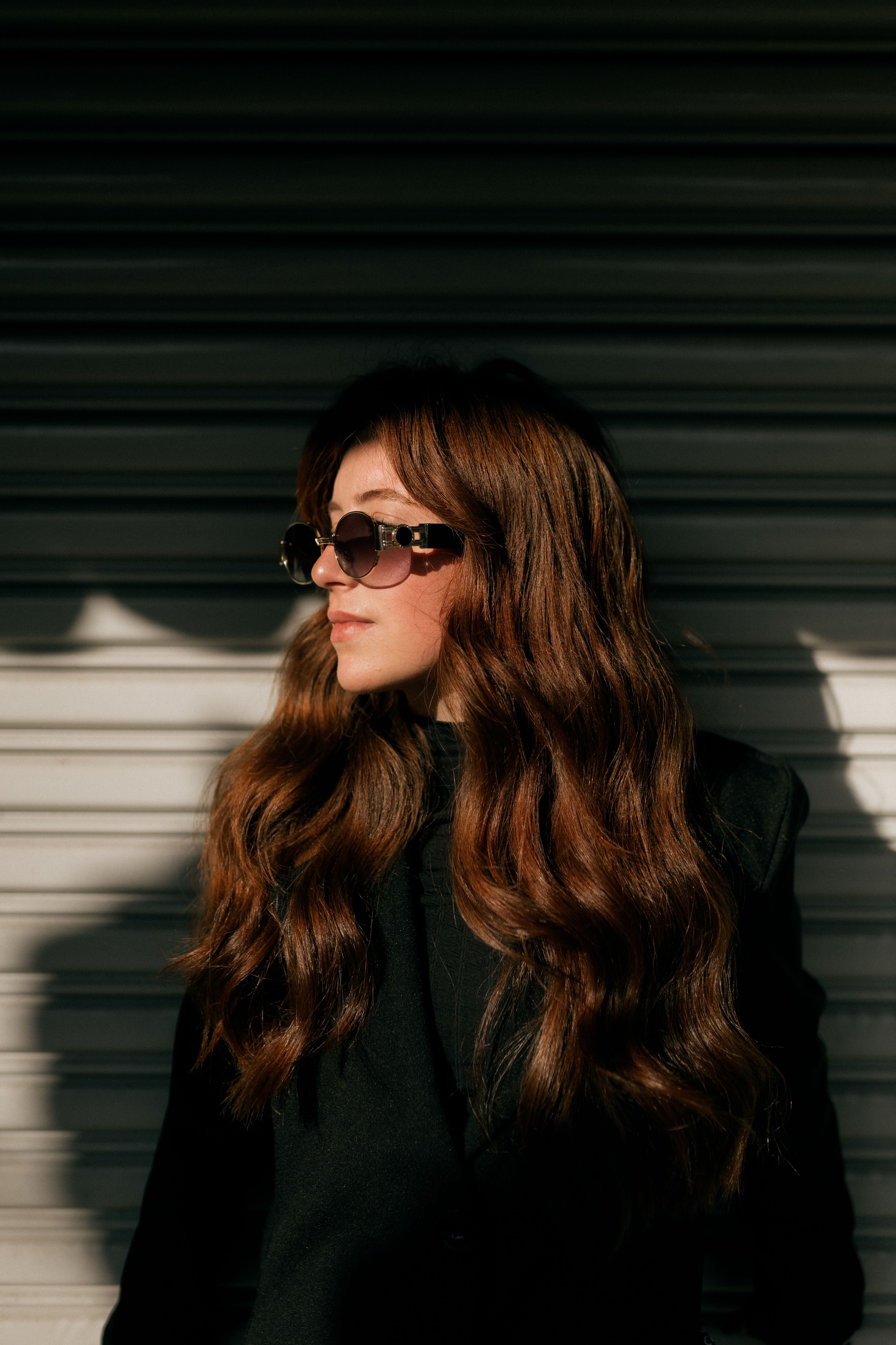 Stylish Woman in Sunglasses with Long Hair · Free Stock Photo