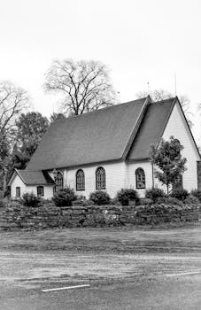 Black and white view of a traditional wooden church in Jönköpings län, Sweden.