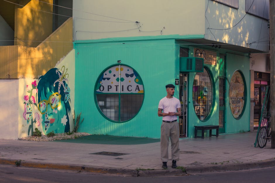 Vibrant street corner in Argentina featuring a colorful mural and modern architecture.