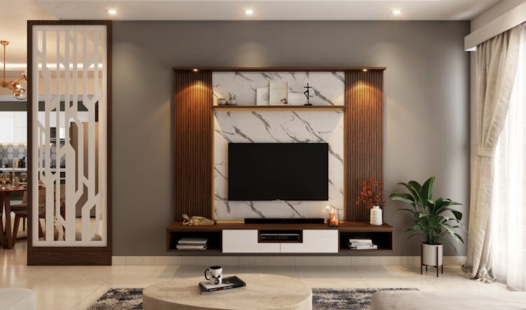 Black Flat Screen TV On The Wall