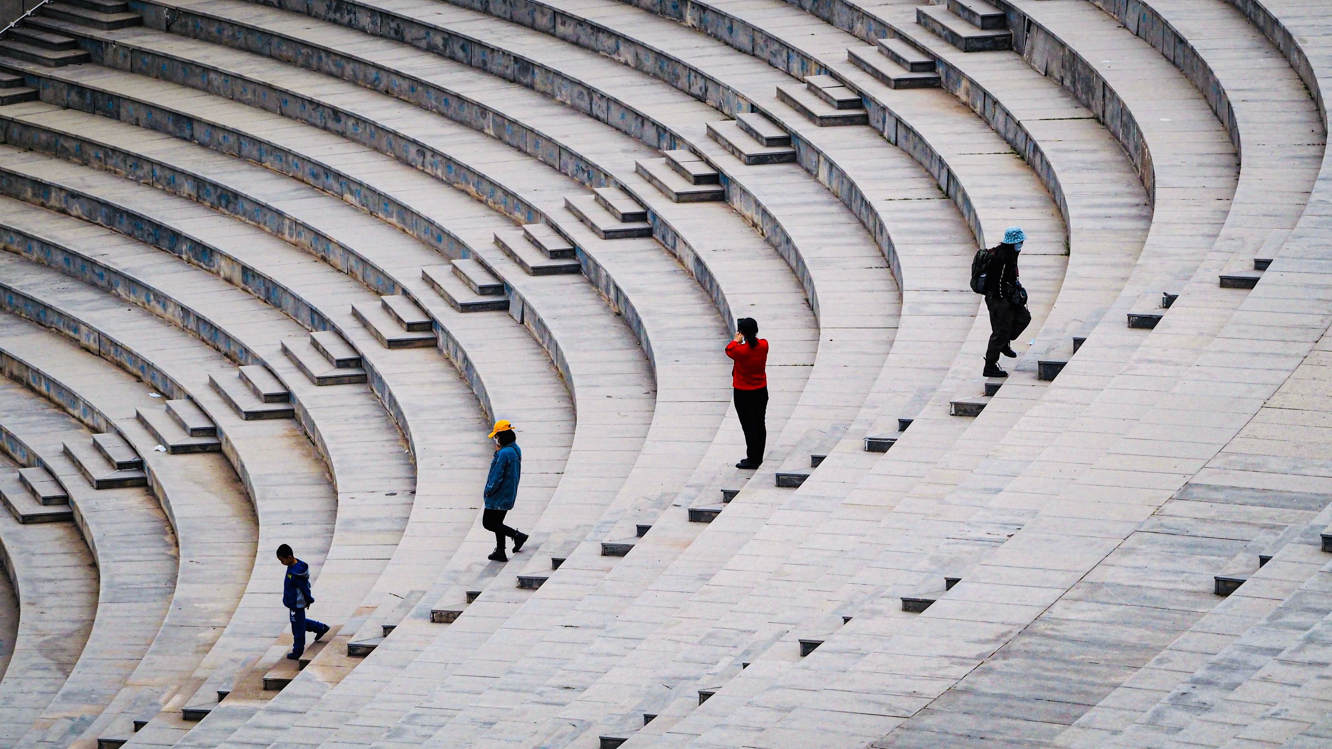 People Walking on Amphitheater Steps from Above · Free Stock Photo