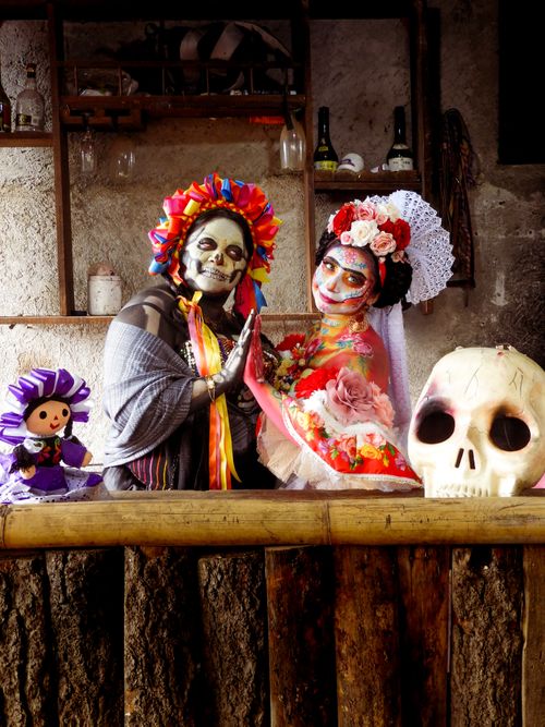 Free Colorful Día de los Muertos scene in Mexico City with traditional clothing and makeup. Stock Photo