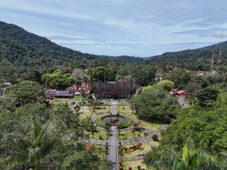 Explore the lush landscape and traditional architecture of West Sumatra, Indonesia.