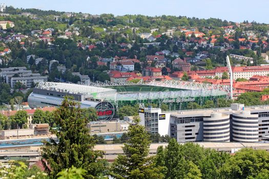 Scenic aerial shot of Allianz Stadion surrounded by lush greenery in Vienna, Austria.