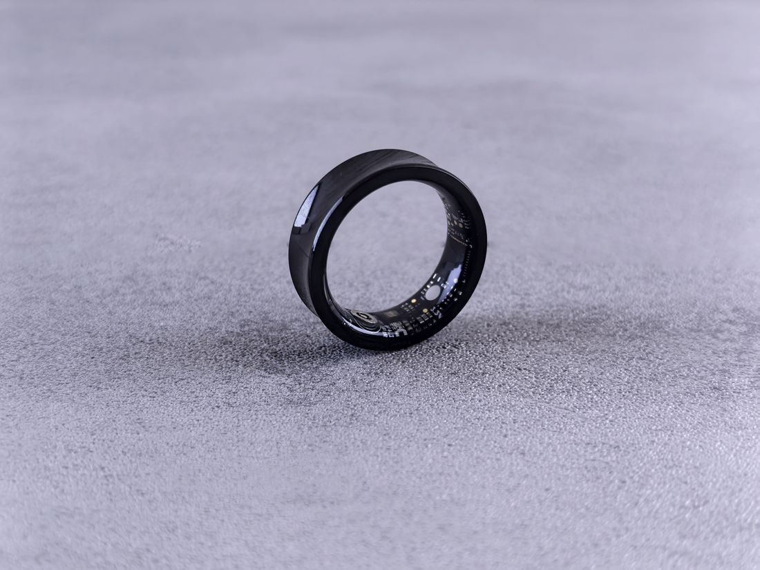 A matte black smart ring on a grey surface — photo by Andrey Matveev on Pexels
