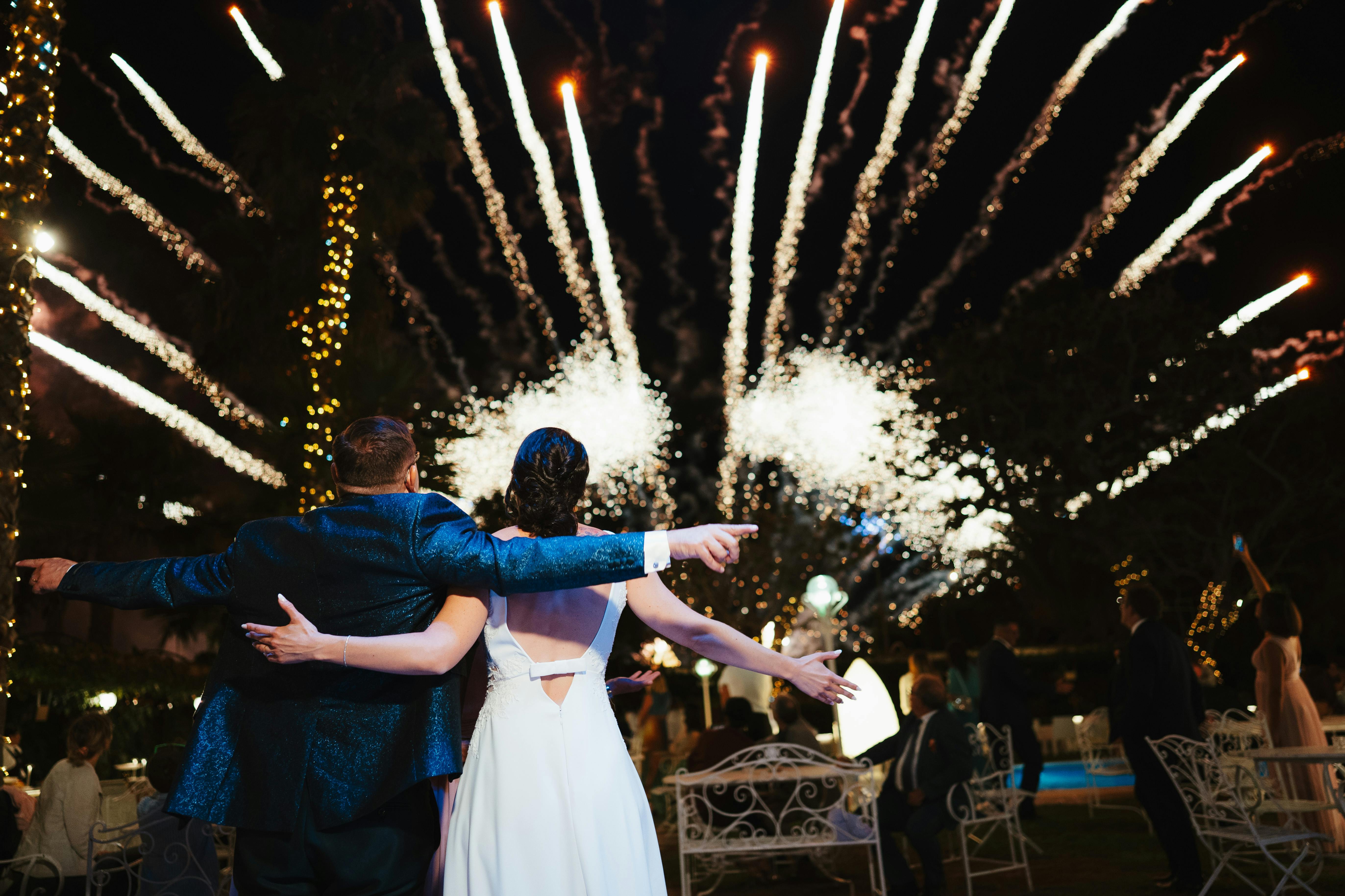 Fireworks over a crowded Fourth of July celebration