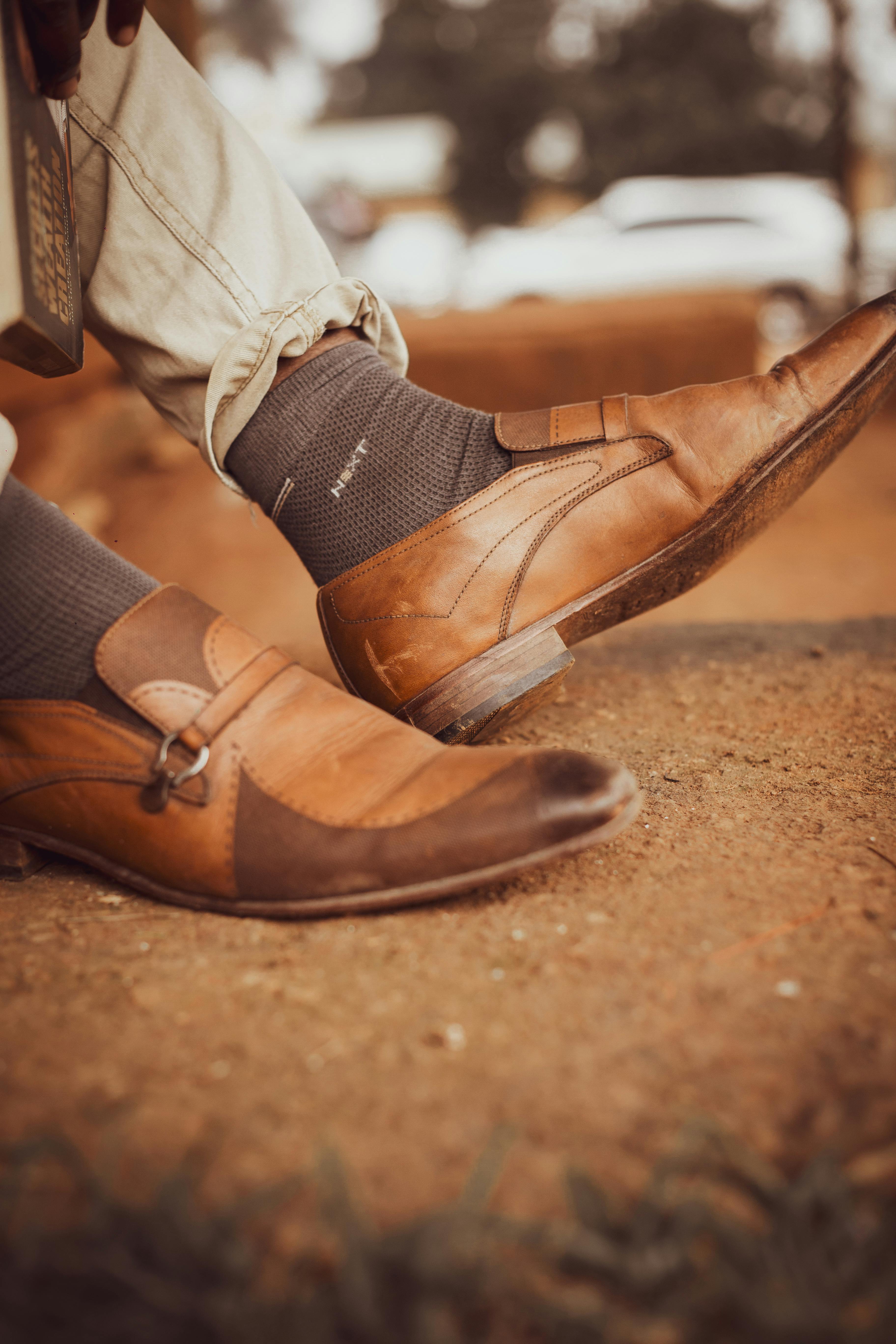 Tan handmade loafers worn outdoors — lifestyle launch