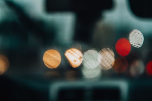 Free Colorful abstract bokeh of city lights in the night, creating a dreamy and artistic effect. Stock Photo