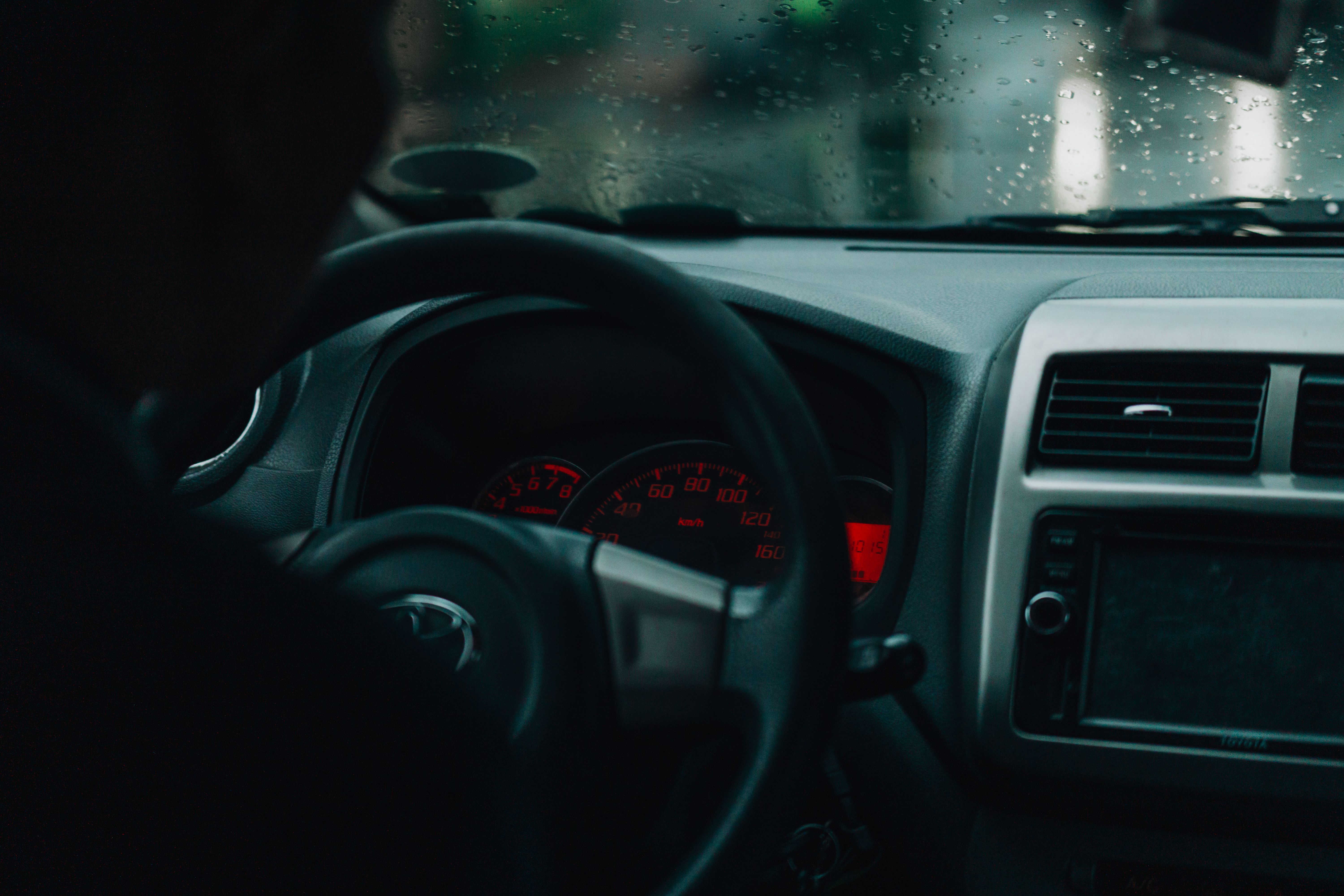 Rainy Day Driving with Dashboard View · Free Stock Photo