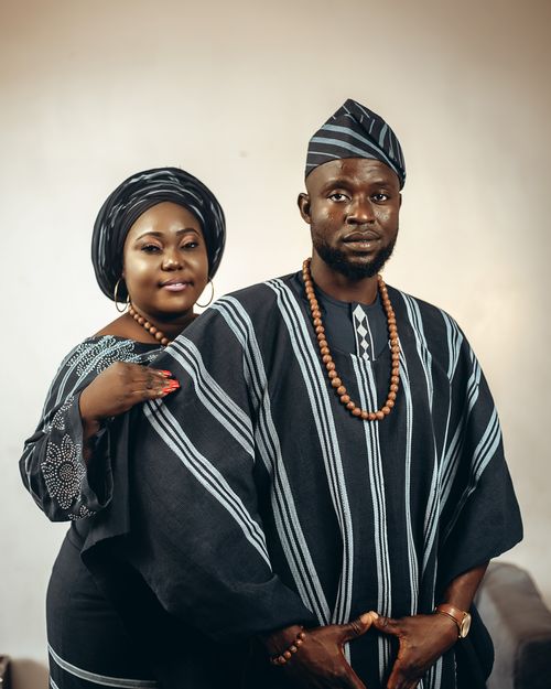 Free A couple dressed in traditional Nigerian clothing, showcasing cultural fashion. Stock Photo
