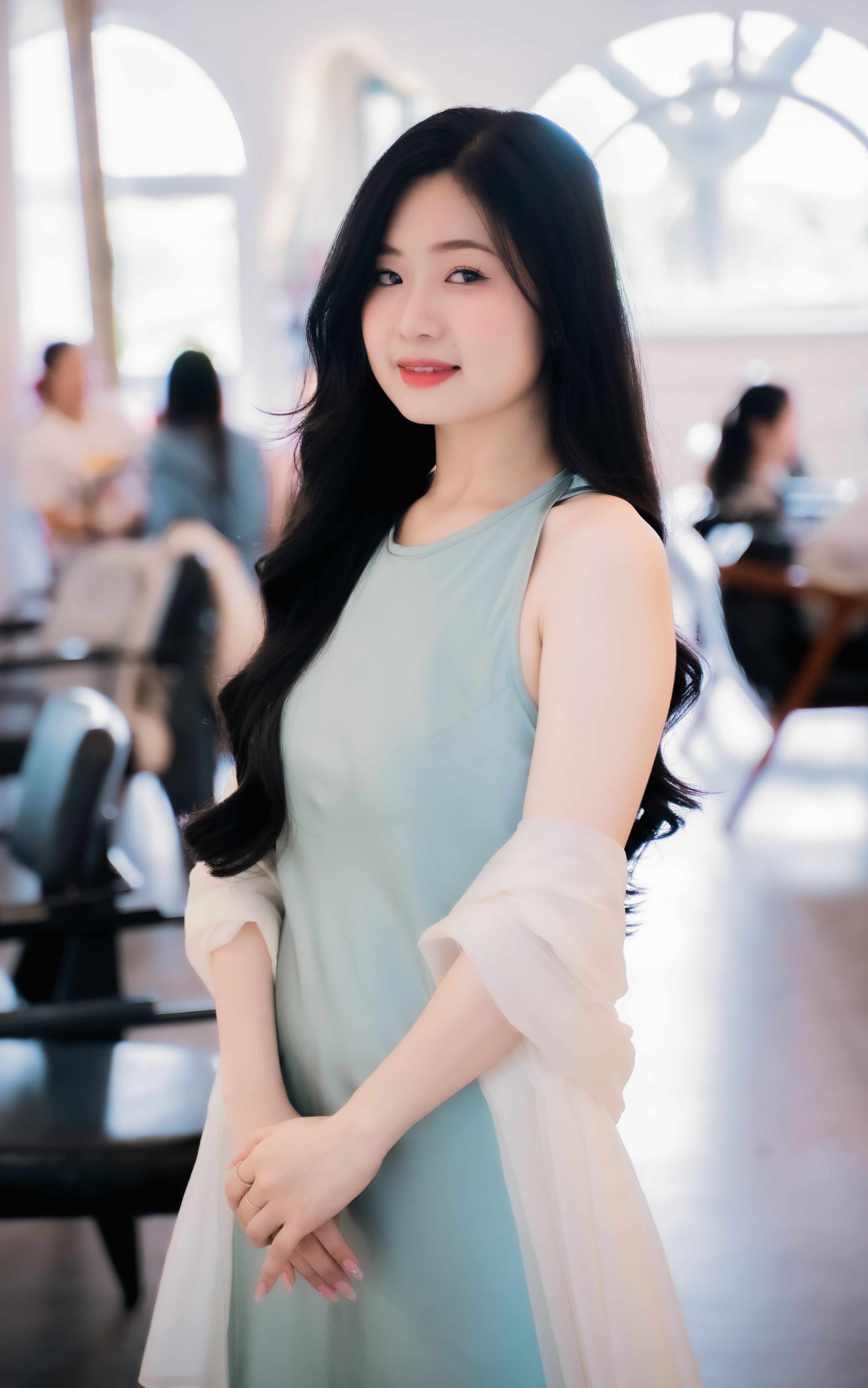 Portrait of Woman in Elegant Indoor Setting · Free Stock Photo