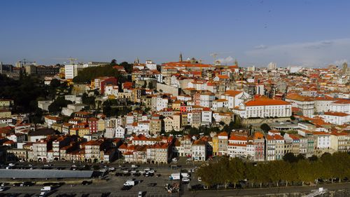 Free Stunning aerial view of colorful buildings in Porto, Portugal under a clear sky, showcasing vibrant architecture. Stock Photo