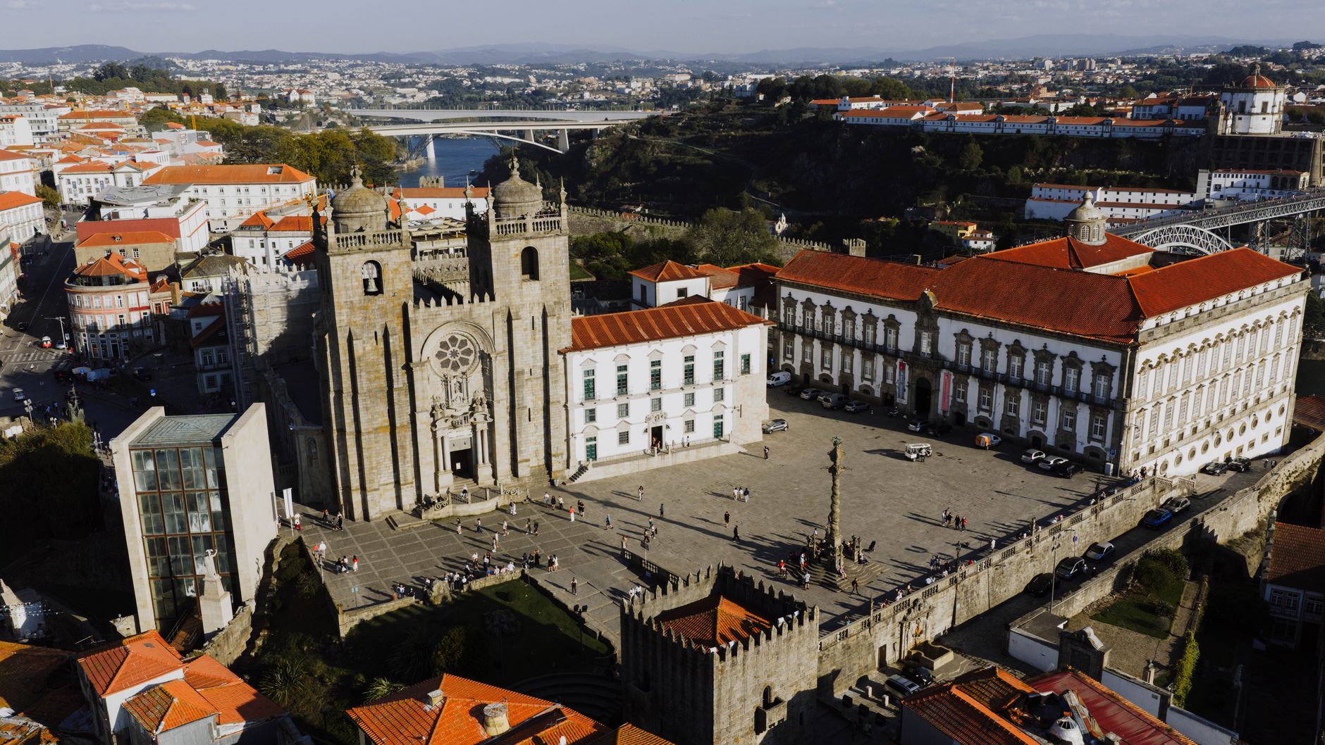 Aerial view of Porto Cathedral and its stone terrace over the old town