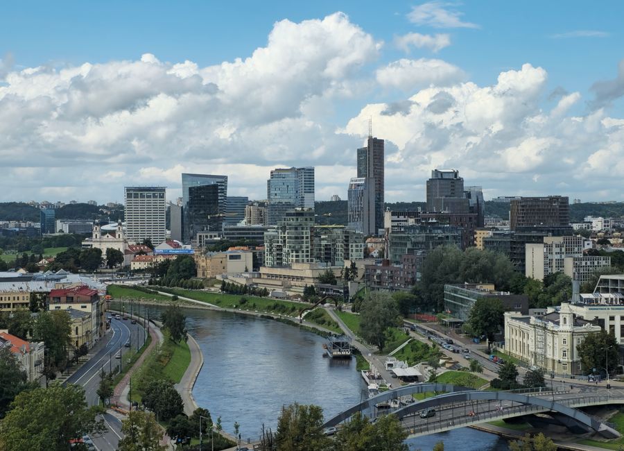 Stunning day view of Vilnius city skyline with the Neris River and modern architecture.
