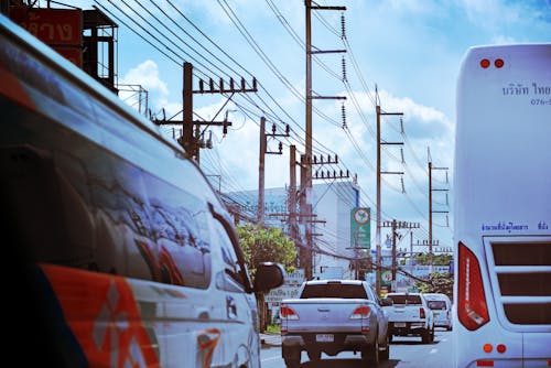 Kostenloses Stock Foto zu bangkok, belebten straße, blaues auto