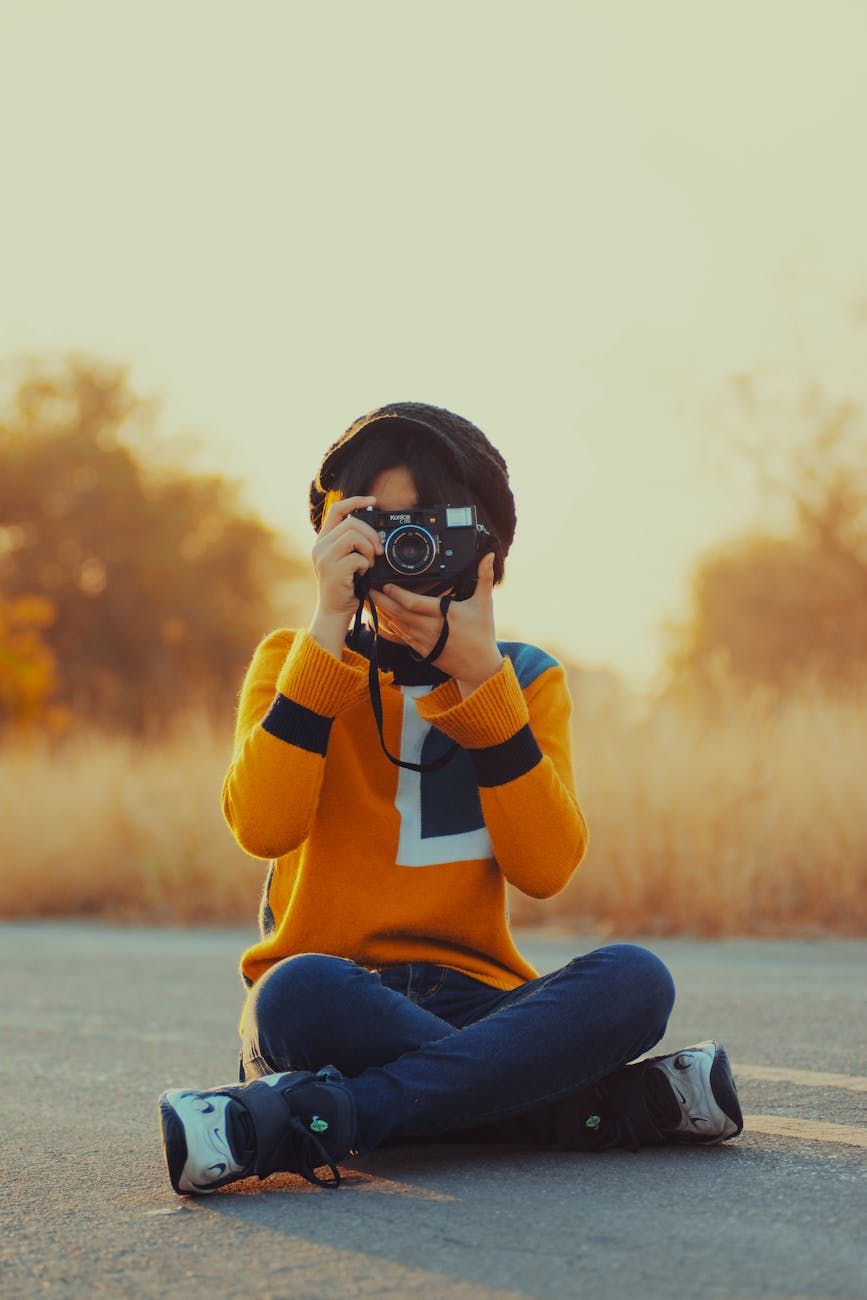 Photographer shooting outdoors with a vintage camera
