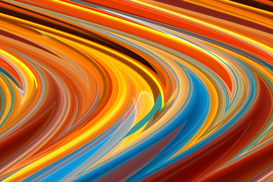 Dynamic abstract artwork featuring vibrant swirls of orange, yellow, and blue creating movement and energy.