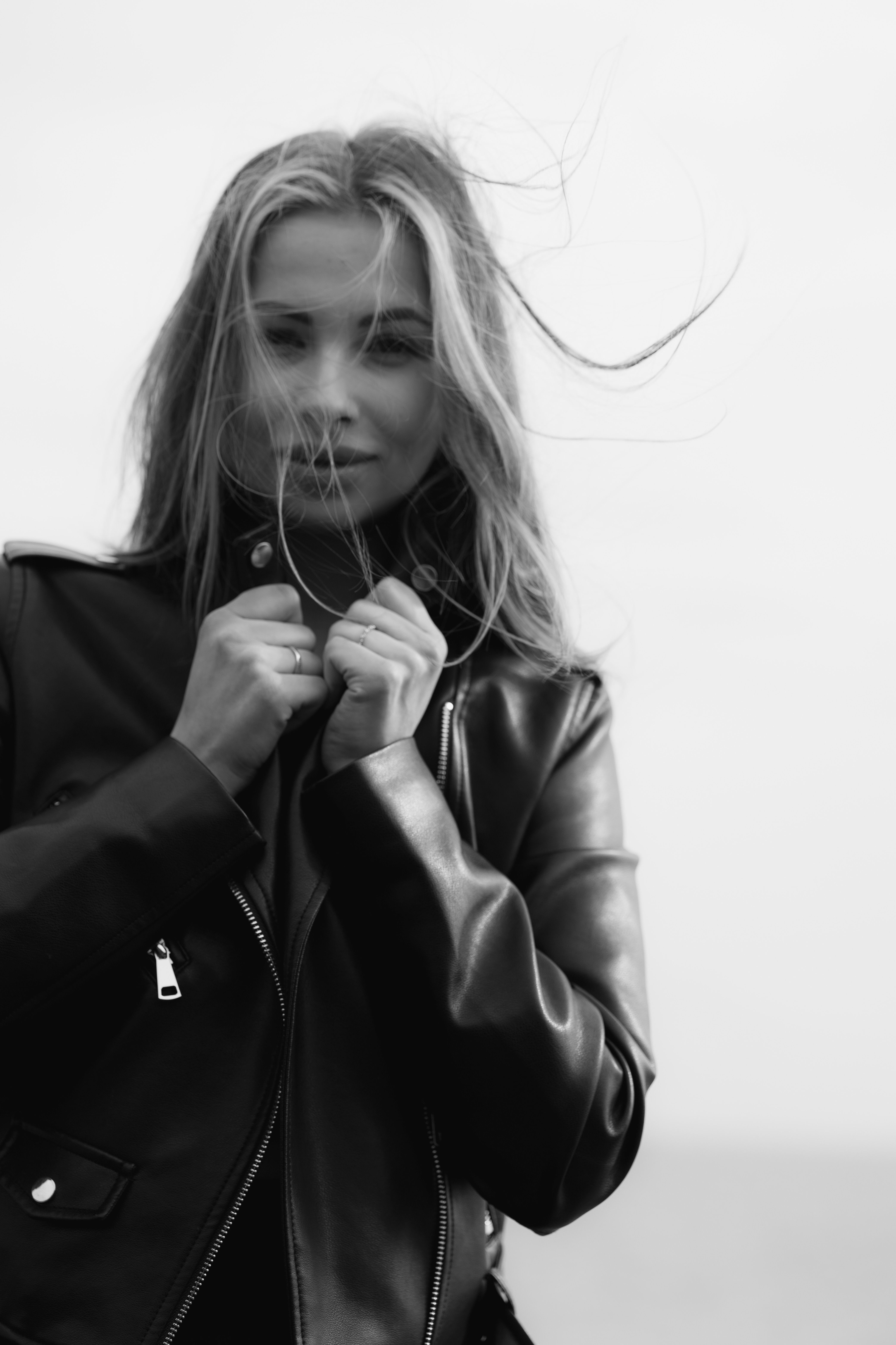Black and White Portrait of Woman in Leather Jacket · Free Stock Photo