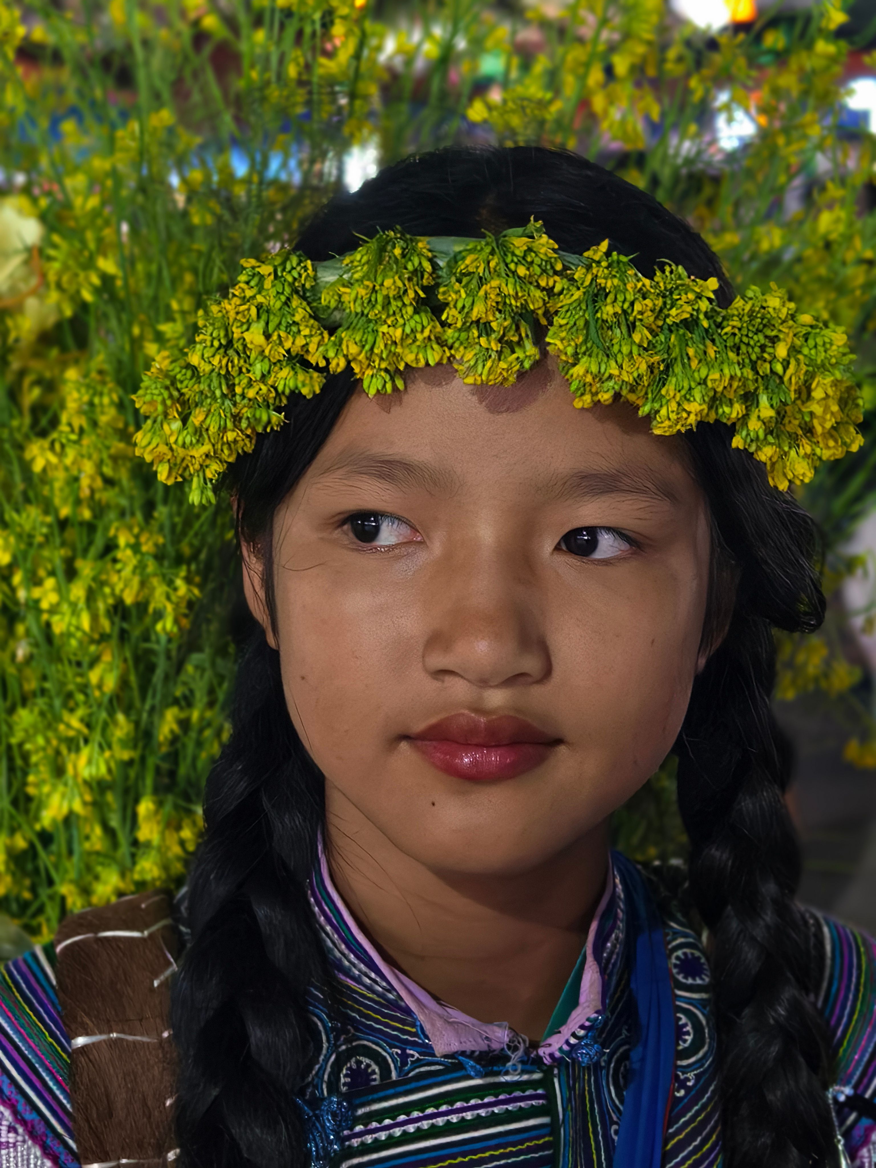 Young Girl in Traditional Dress with Floral Headdress · Free Stock Photo