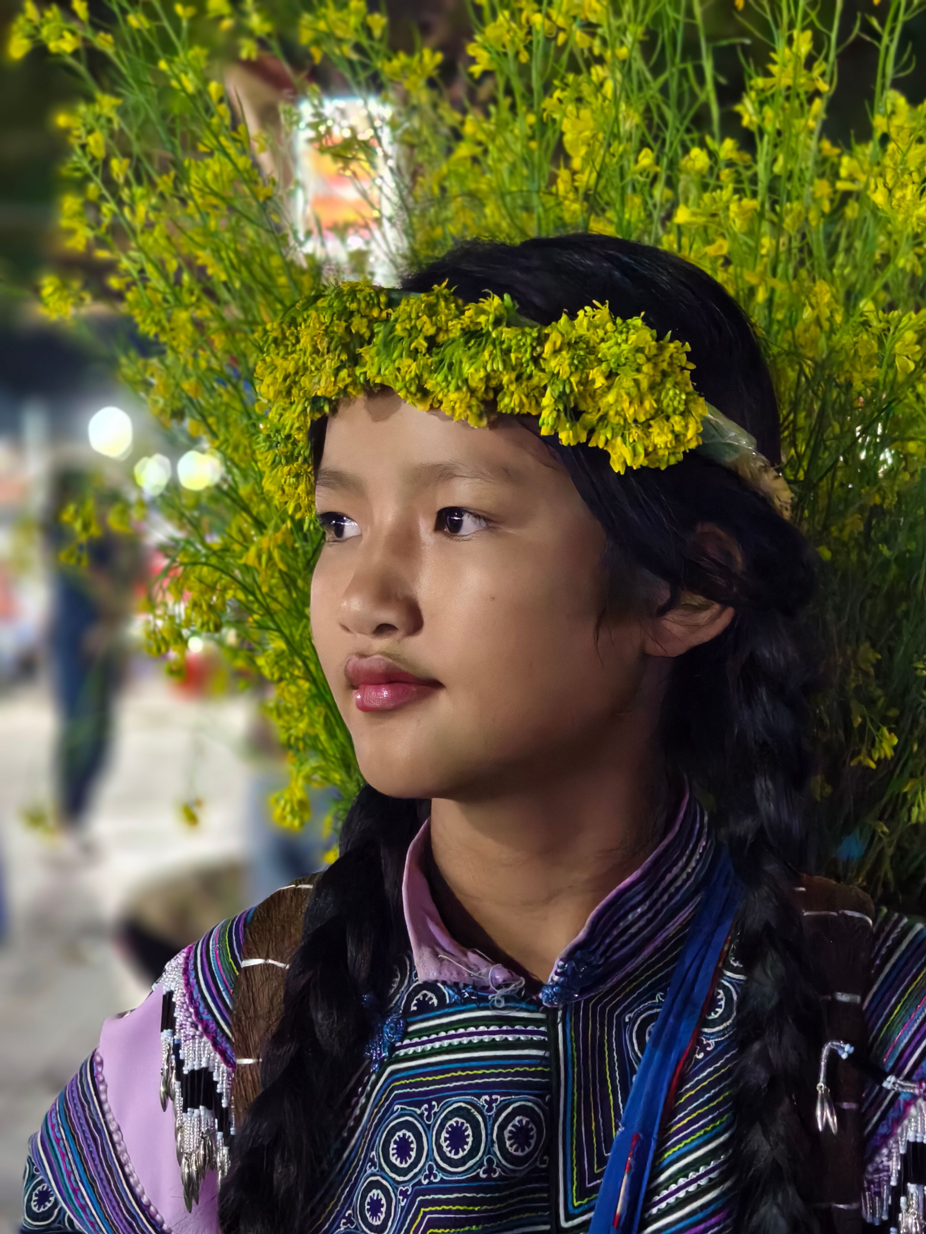 Young Girl in Traditional Dress with Floral Headdress · Free Stock Photo
