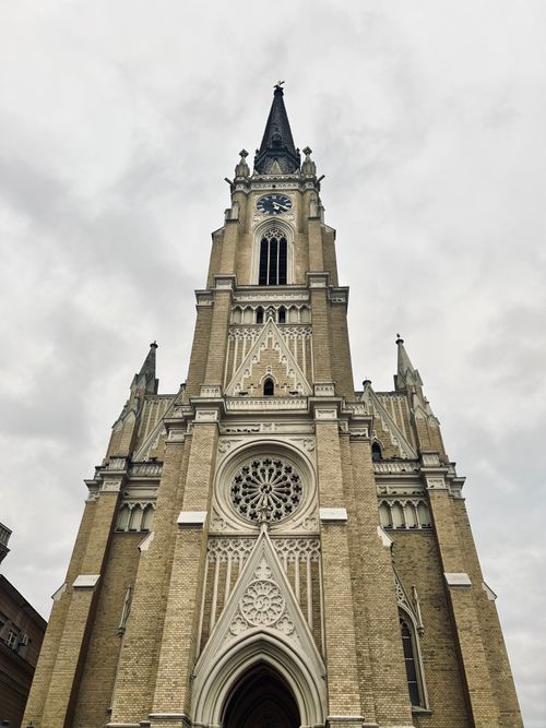 Free Stunning view of the Novi Sad Cathedral's architecture under an overcast sky. Stock Photo
